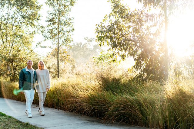The Crossing | Fiteni Homes | Couple Walking Along a Path